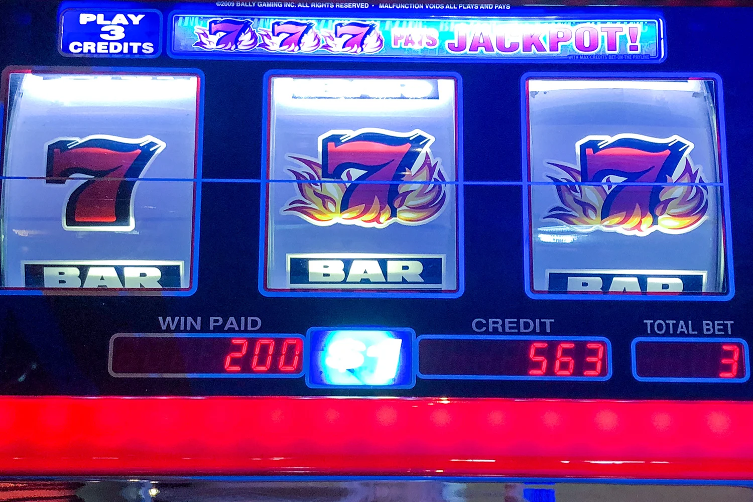 Slot Game Porting and Testing ensuring smooth gameplay on slot machine with jackpot win.